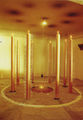 Μάριος Σπηλιόπουλος, Βωμός ή Περιστύλιον, 1991, 8 λαμπάδες από κερί, άμμος, φωτιά, ελαιόλαδο, καλάμια, Sani Beach Hotel, Χαλκιδική