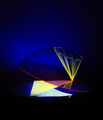 Antonia Papatzanaki, Intersections in the beam of tenxion, 1990, plexiglas, fluorescent fibers, black light, 80 x 50 x 80 cm