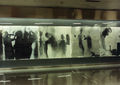 Nikos Kessanlis, The queue, 1999-2000, mec art, sensitized canvas, 2 x 21 m, Omonia metro station