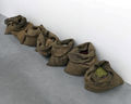 Jannis Kounellis, Untitled, 1969, burlap sacks