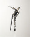 Yiorgos Avgeros, Equilibrist, 1994, metal, rock, height of figure 15 cm